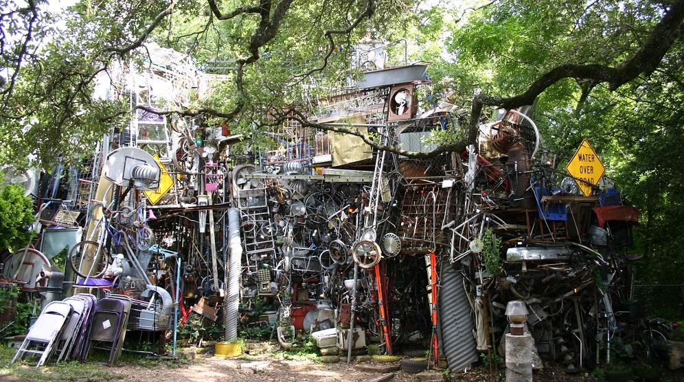 Sculpture made of junk in artist's backyard.