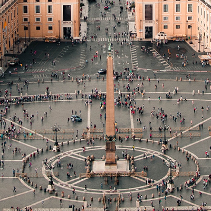 Vatican round plaza from above with people walking