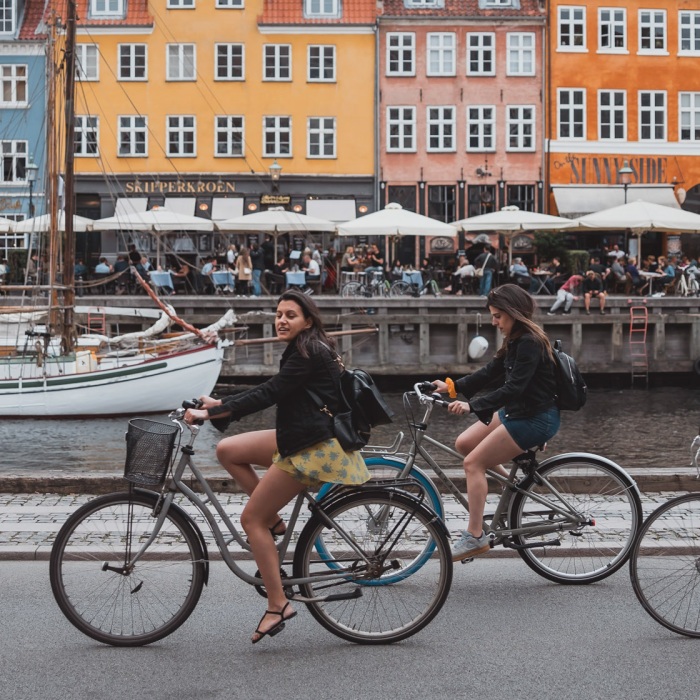 Students bicycle in Copenhagen, Denmark